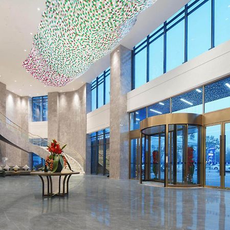 Park Inn By Radisson Nanchong Yilong Star City Plaza Экстерьер фото