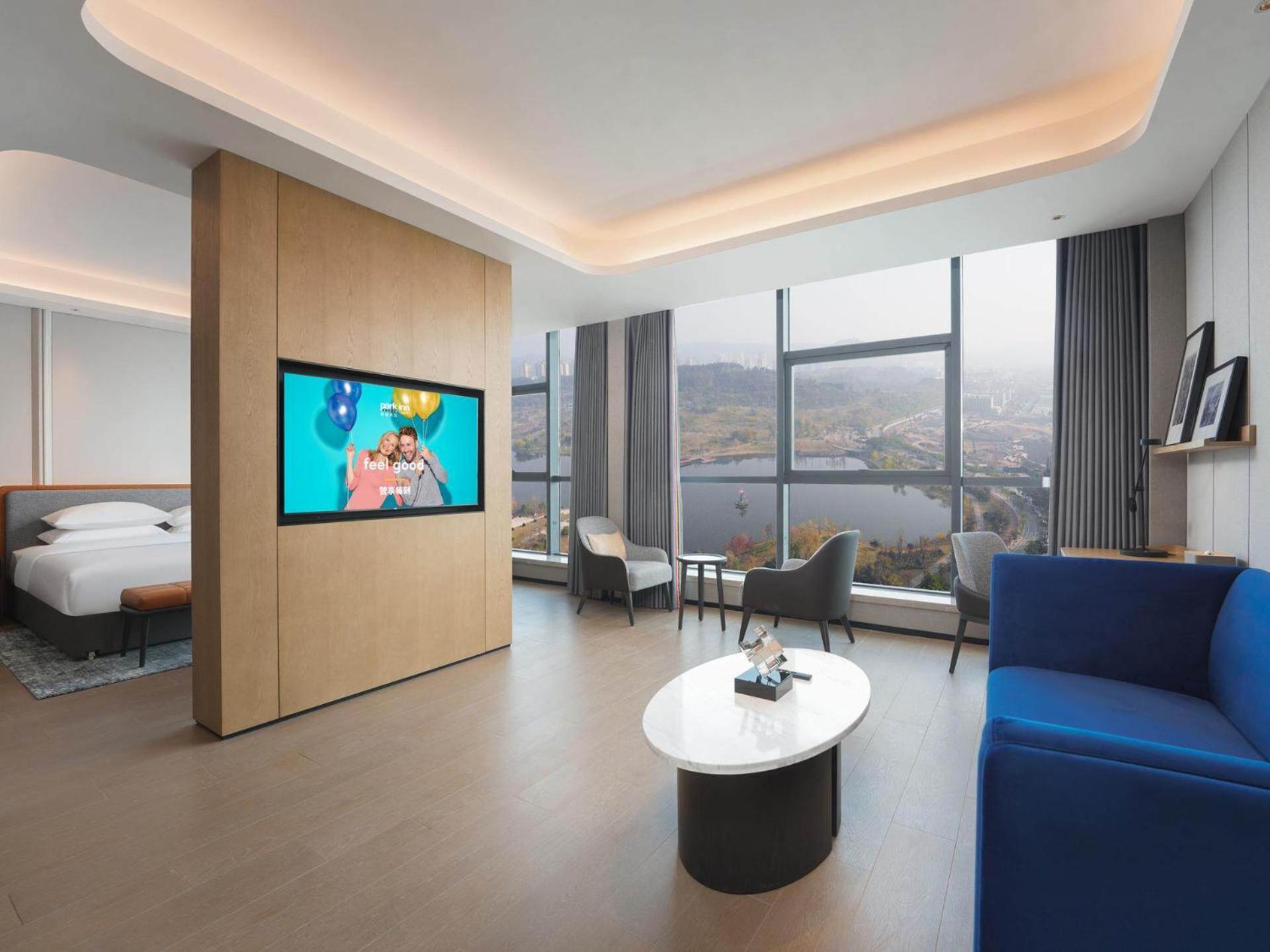Park Inn By Radisson Nanchong Yilong Star City Plaza Экстерьер фото
