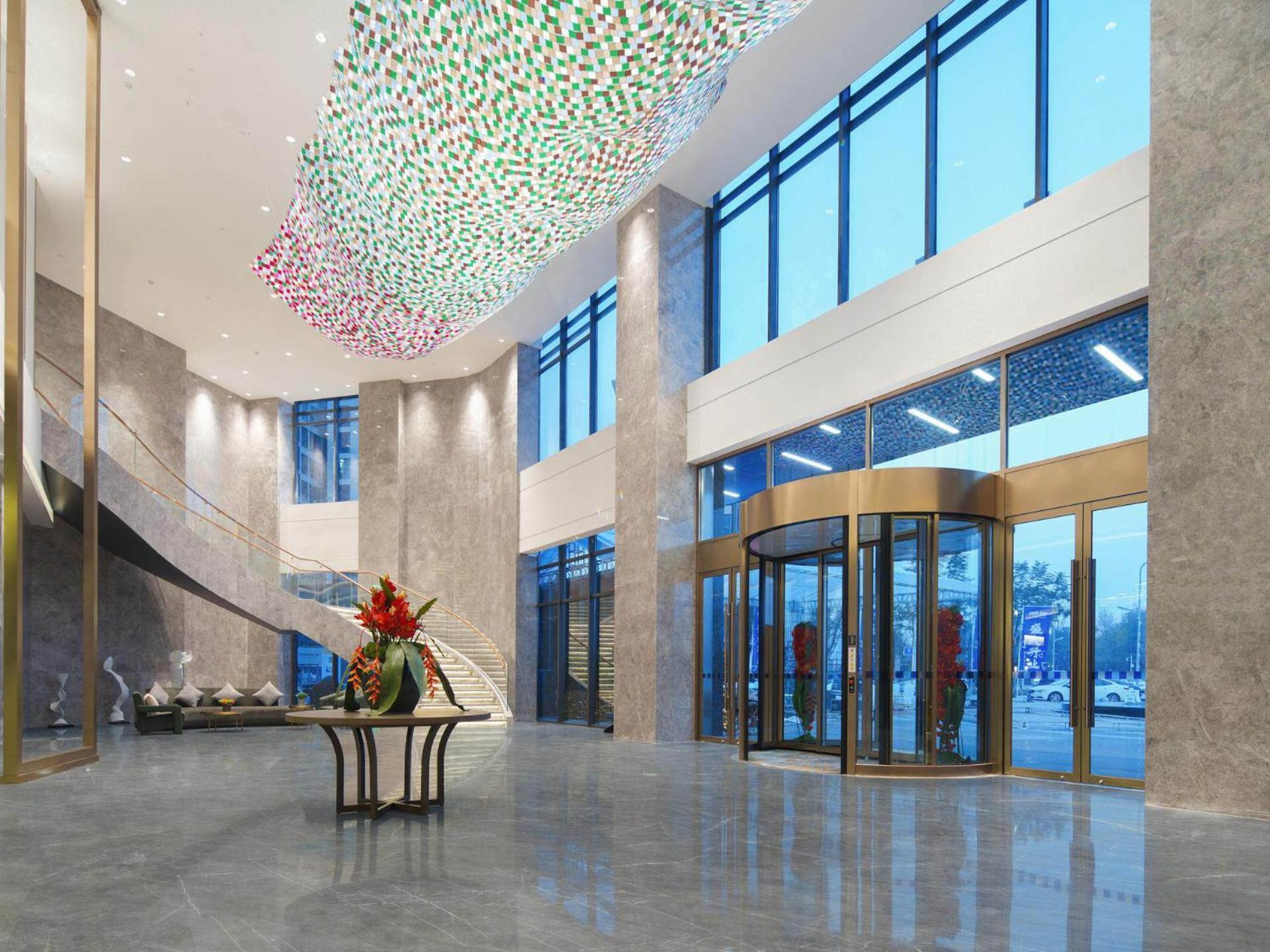 Park Inn By Radisson Nanchong Yilong Star City Plaza Экстерьер фото