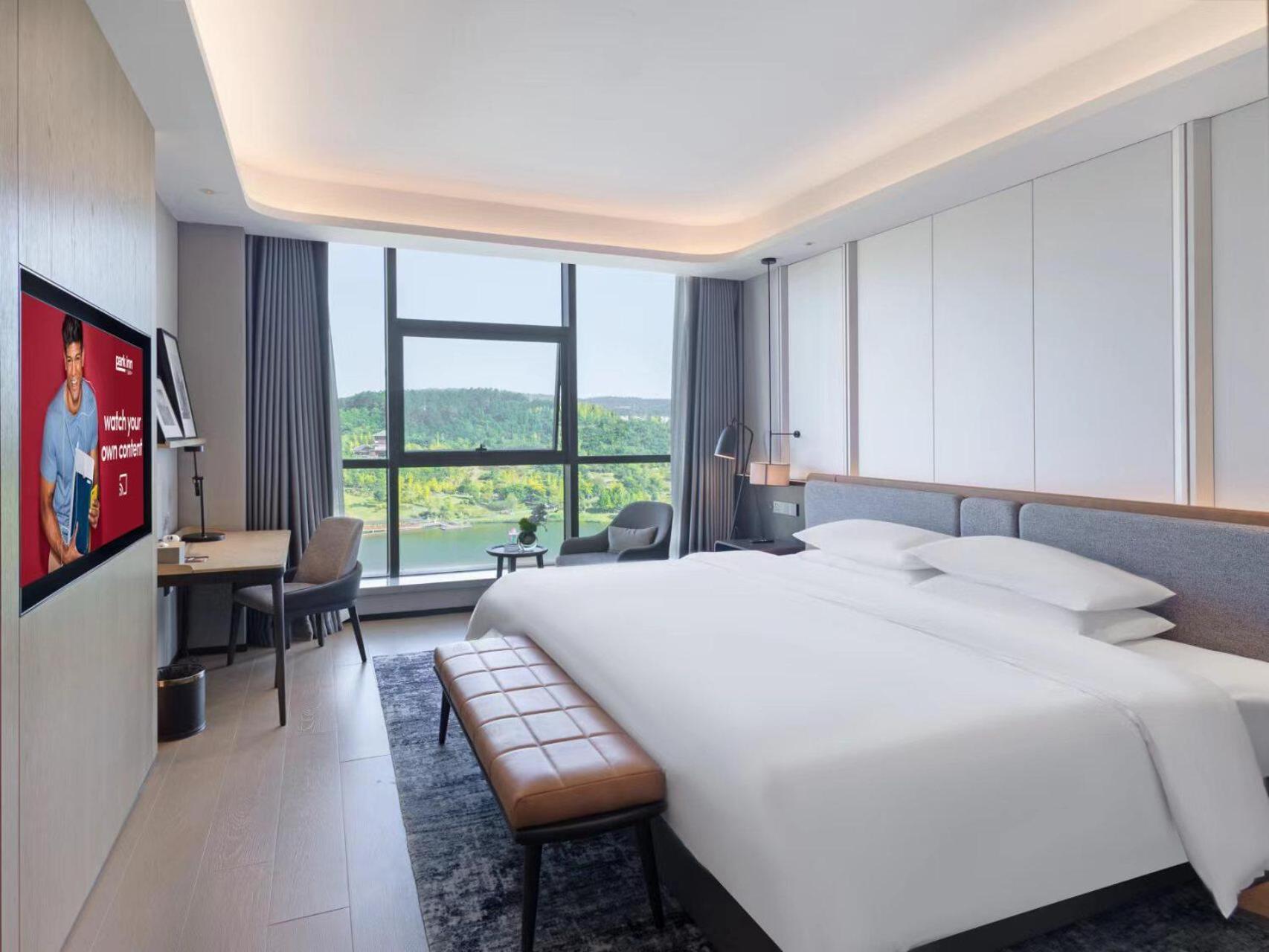 Park Inn By Radisson Nanchong Yilong Star City Plaza Экстерьер фото