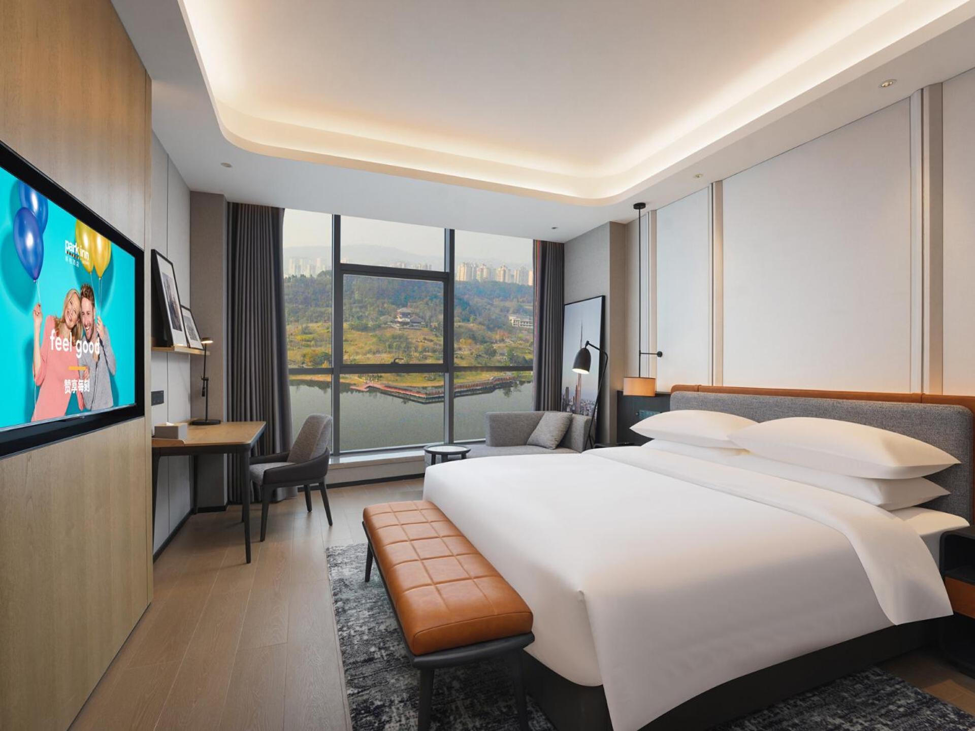 Park Inn By Radisson Nanchong Yilong Star City Plaza Экстерьер фото