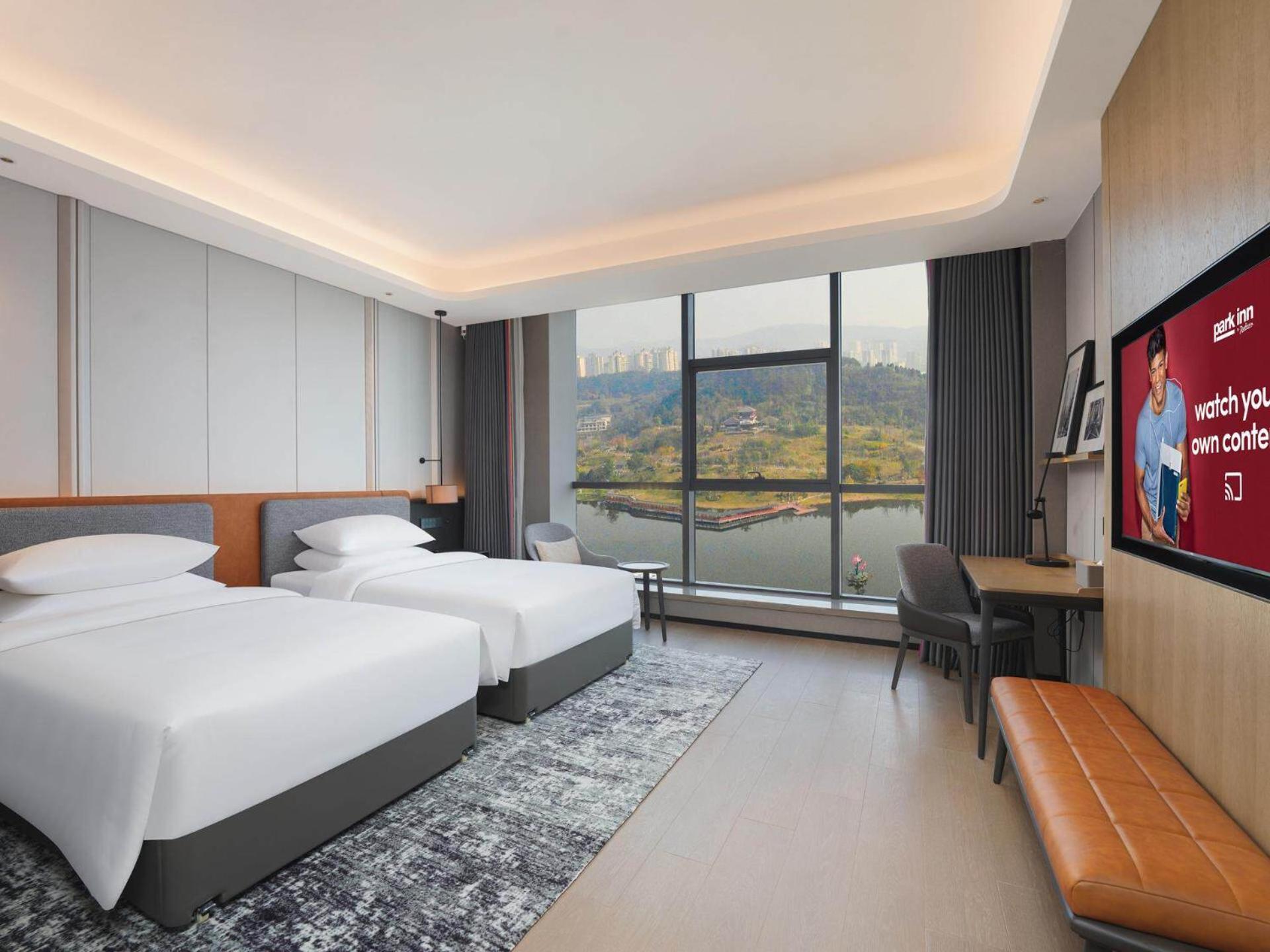 Park Inn By Radisson Nanchong Yilong Star City Plaza Экстерьер фото