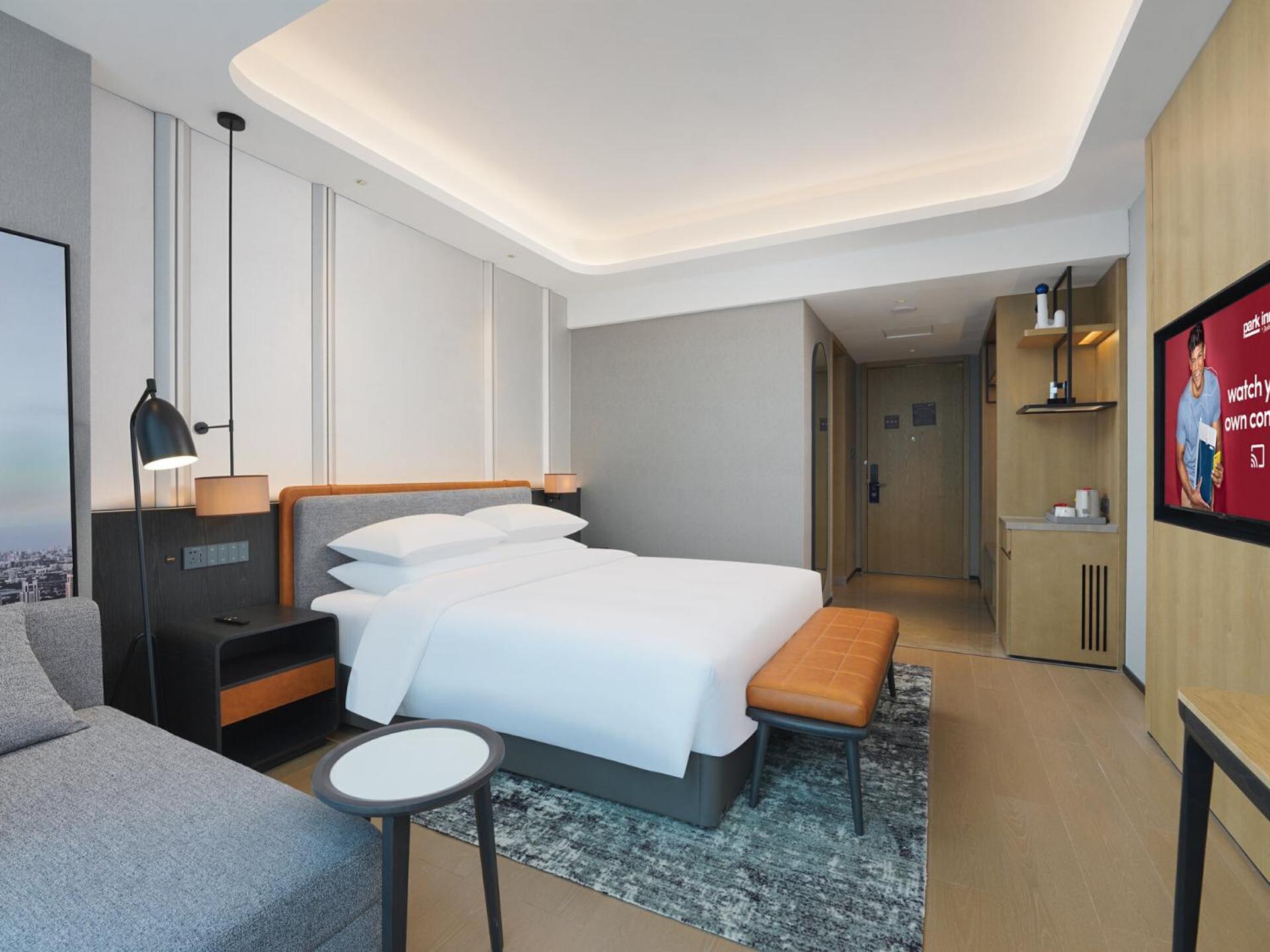 Park Inn By Radisson Nanchong Yilong Star City Plaza Экстерьер фото