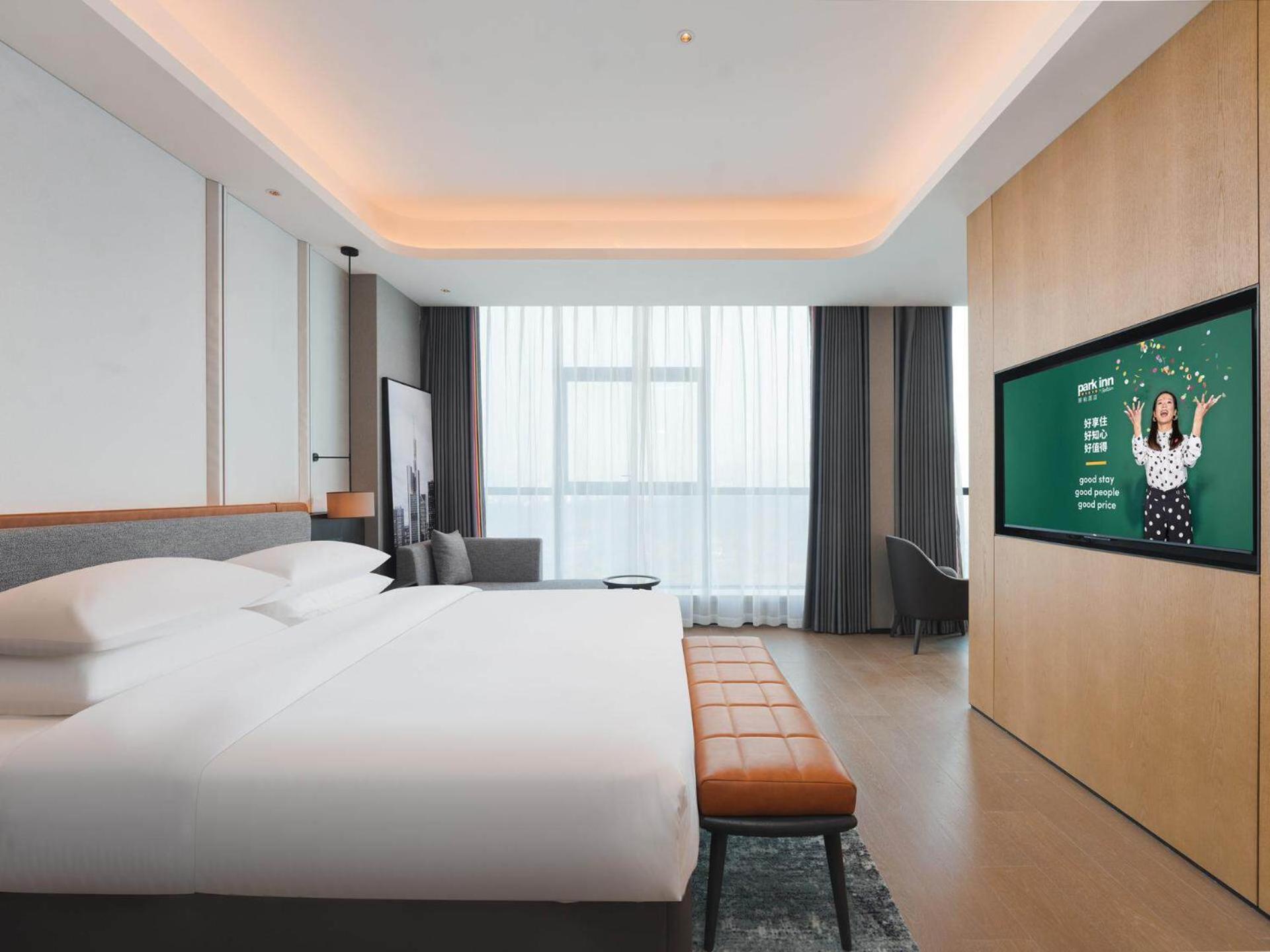 Park Inn By Radisson Nanchong Yilong Star City Plaza Экстерьер фото