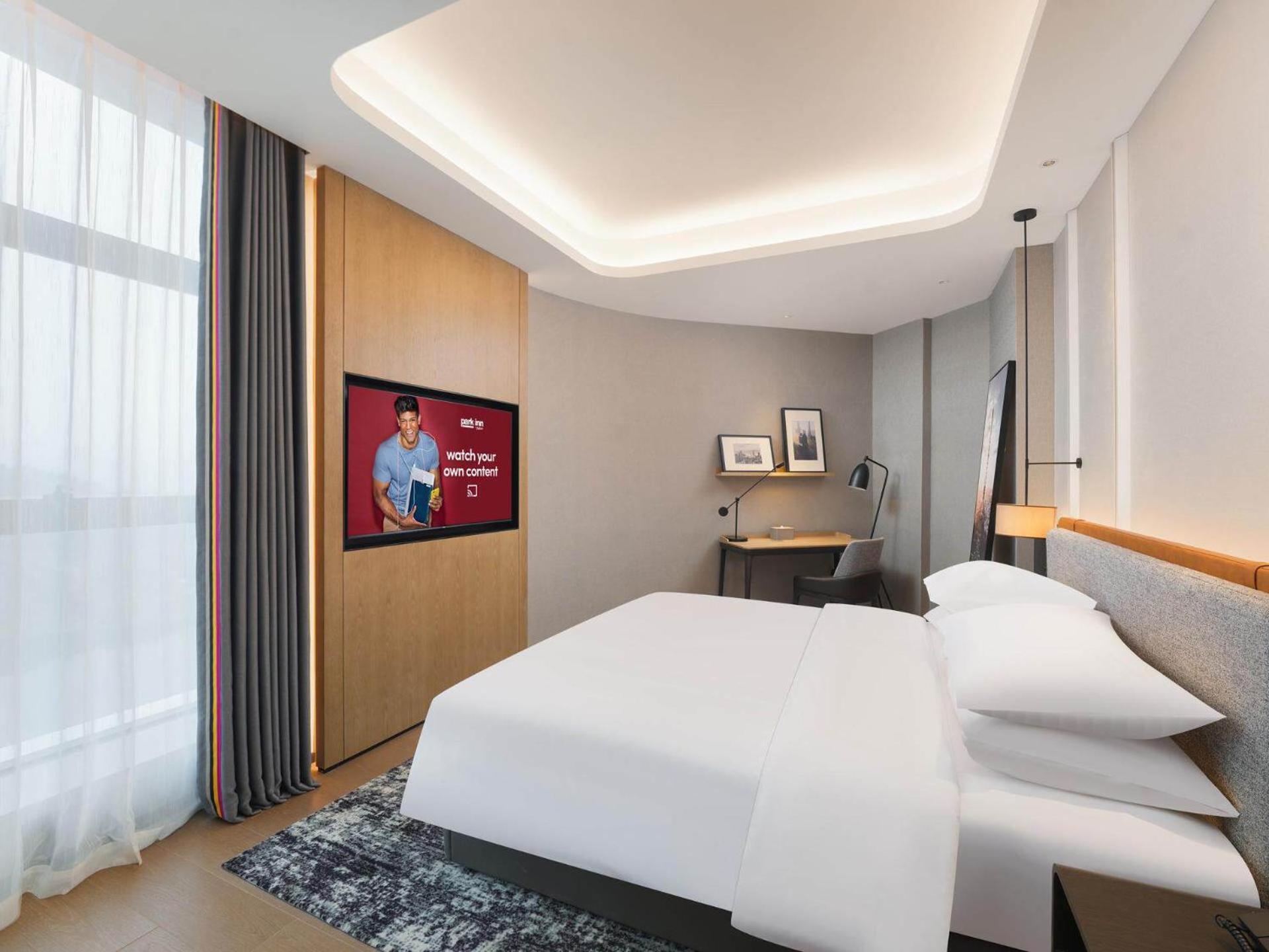 Park Inn By Radisson Nanchong Yilong Star City Plaza Экстерьер фото