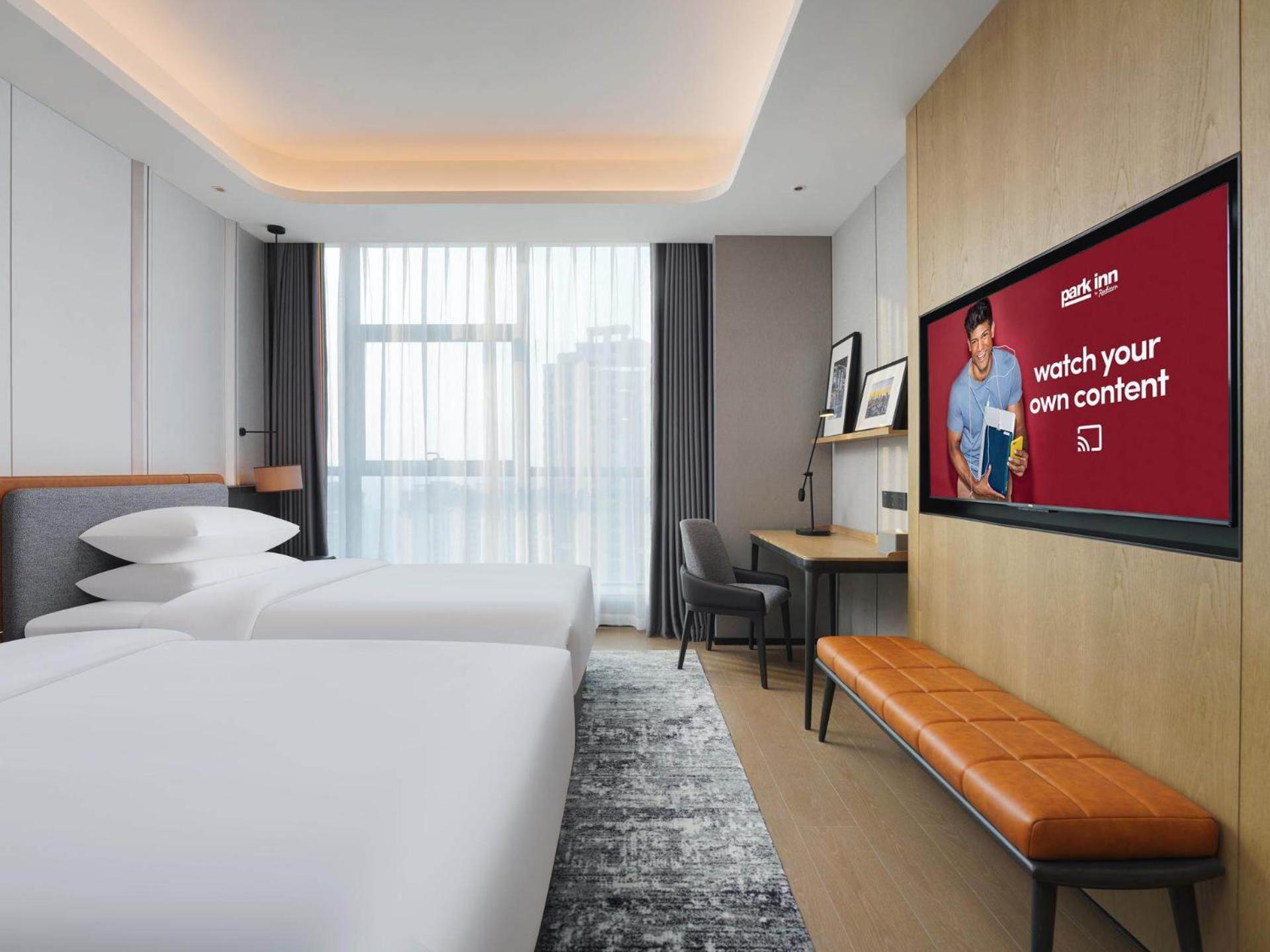 Park Inn By Radisson Nanchong Yilong Star City Plaza Экстерьер фото