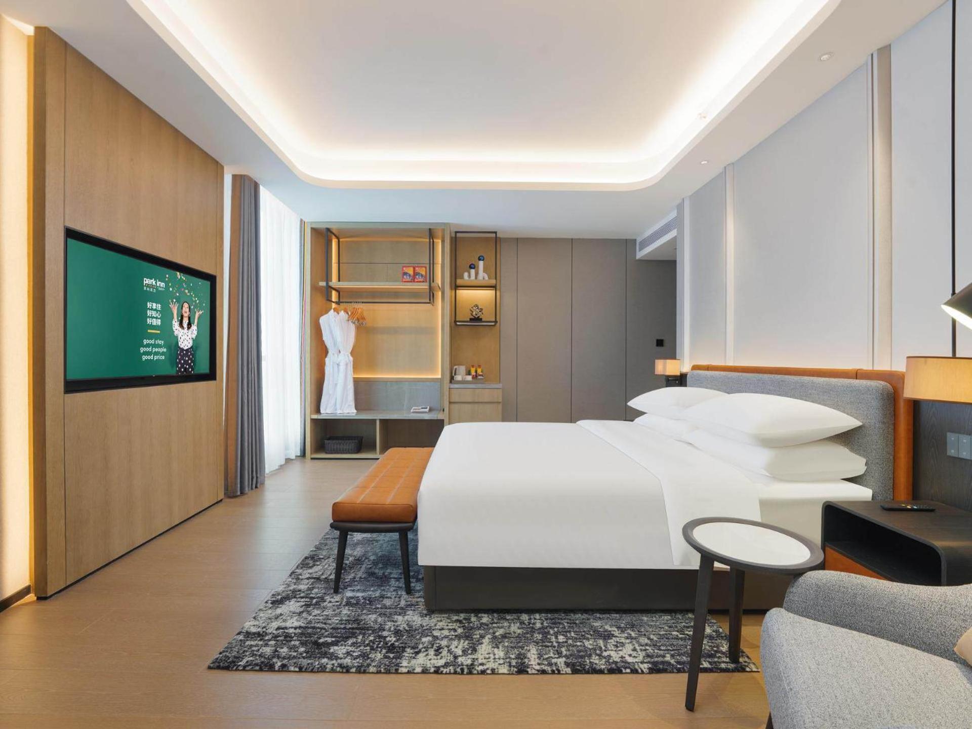 Park Inn By Radisson Nanchong Yilong Star City Plaza Экстерьер фото