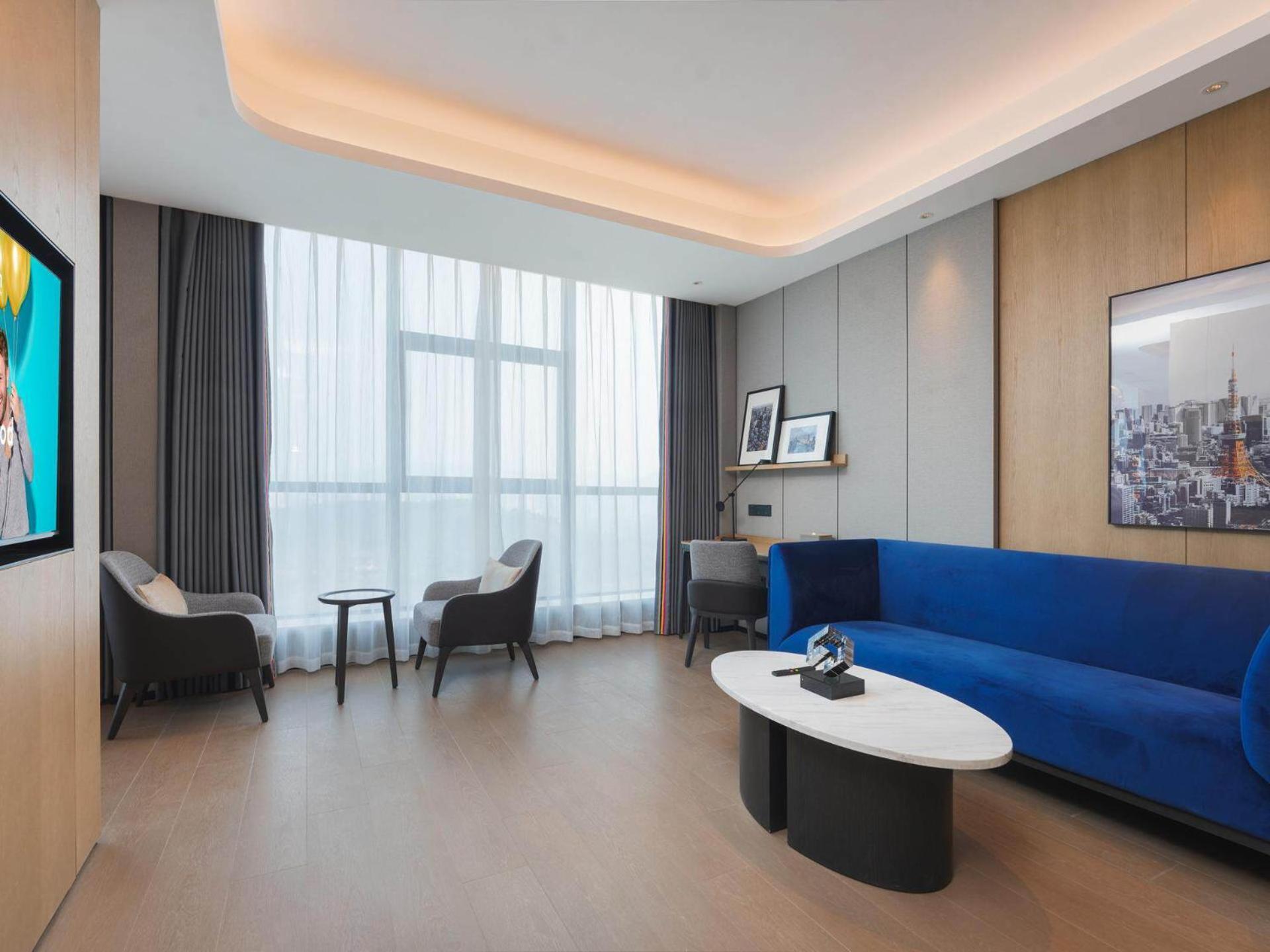 Park Inn By Radisson Nanchong Yilong Star City Plaza Экстерьер фото